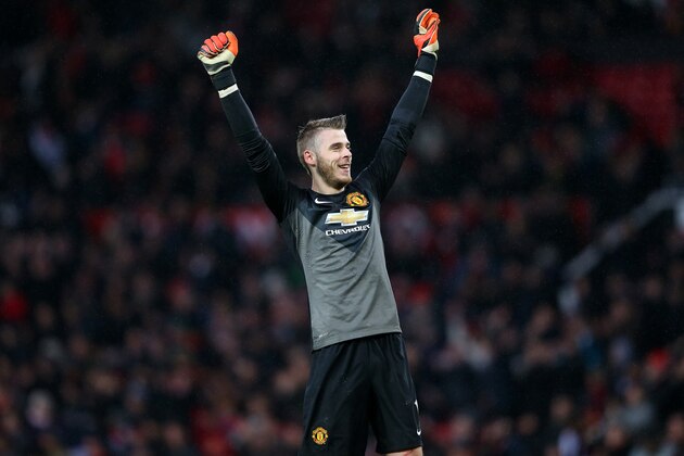 MANCHESTER, ENGLAND - DECEMBER 14:  David De Gea of Manchester United celebrates the third goal during the Barclays Premier League match between Manchester United and Liverpool at Old Trafford on December 14, 2014 in Manchester, England.  (Photo by Alex Livesey/Getty Images)