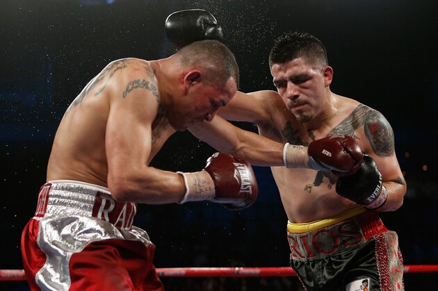 LAS VEGAS, NV - MARCH 30:  (R-L) Brandon Rios lands a right to the head of Mike Alvarado in their WBO interim junior welterweight championship bout at the Mandalay Bay Events Center on March 30, 2013 in Las Vegas, Nevada. (Photo by Josh Hedges/Getty Images)