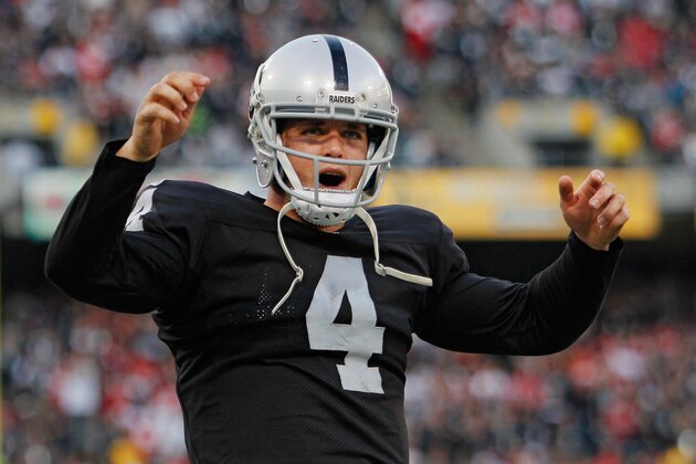OAKLAND, CA - DECEMBER 7: Quarterback Derek Carr #4 of the Oakland Raiders celebrates a win against the San Francisco 49ers late in the fourth quarter on December 7, 2014 at O.co Coliseum in Oakland, California. The Raiders won 24-13. (Photo by Brian Bahr/Getty Images) OAKLAND, CA - DECEMBER 7: Quarterback Derek Carr #4 of the Oakland Raiders celebrates a win against the San Francisco 49ers late in the fourth quarter on December 7, 2014 at O.co Coliseum in Oakland, California. The Raiders won 24-13. (Photo by Brian Bahr/Getty Images)