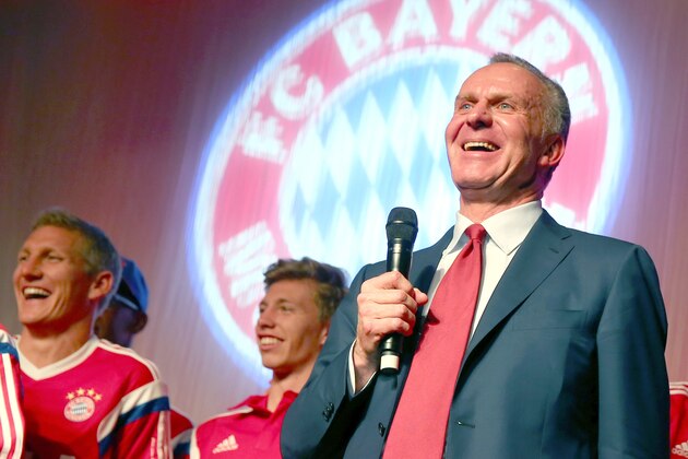 In this picture taken  Saturday May 17, 2014, Bayern Munich's  CEO Karl-Heinz Rummenigge  speaks during the after-match party after the club won the German soccer cup final  against Borussia Dortmund in Berlin. (AP Photo/ Alexander Hassenstein,Pool)