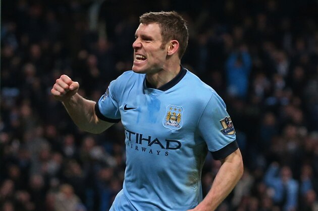 MANCHESTER, ENGLAND - JANUARY 04:  James Milner of Manchester City celebrates after scoring a goal to level the scores at 1-1 during the FA Cup Third Round match between  Manchester City and Sheffield Wednesday at Etihad Stadium on January 4, 2015 in Manchester, England.  (Photo by Jan Kruger/Getty Images)