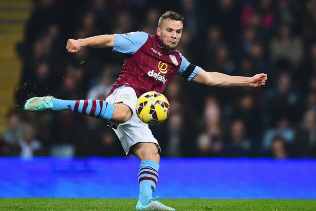 BIRMINGHAM, ENGLAND - NOVEMBER 24:  Tom Cleverley of Aston Villa shoots during the Barclays Premier League match between Aston Villa and Southampton at Villa Park on November 24, 2014 in Birmingham, England.  (Photo by Laurence Griffiths/Getty Images)