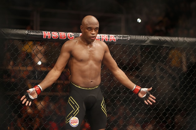 Anderson Silva, from Brazil, fights Stephan Bonnar, from the United States, during their light heavyweight mixed martial arts bout at the Ultimate Fighting Championship (UFC) 153 in Rio de Janeiro, Brazil, Sunday Oct.  14, 2012. Silva defeated Bonnar. (AP Photo/Felipe Dana)