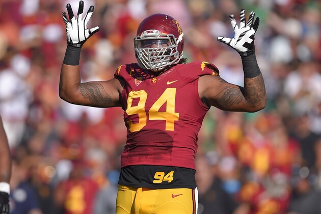 Southern California defensive end Leonard Williams gestures to fans during the first half an NCAA college football game against Notre Dame, Saturday, Nov. 29, 2014, in Los Angeles. Southern California won 49-14. (AP Photo/Mark J. Terrill)