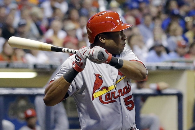 St. Louis Cardinals' Xavier Scruggs is hit by a pitch during the third inning of a baseball game against the Milwaukee Brewers Thursday, Sept. 4, 2014, in Milwaukee. (AP Photo/Morry Gash)