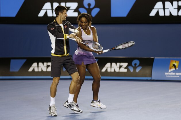 Serbia's Novak Djokovic and Serena Williams of the US perform the gangnam style dance during the Kids Tennis Day at Melbourne Park ahead of the Australian Open tennis championship in Melbourne, Australia, Saturday, Jan. 12, 2013. (AP Photo/Andy Wong)