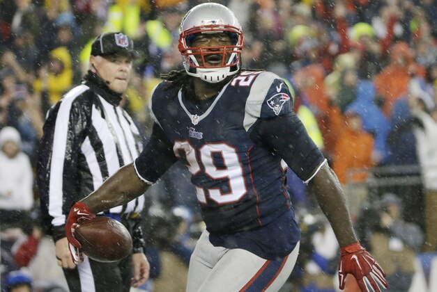 New England Patriots running back LeGarrette Blount celebrates after scoring on a 13-yard touchdown run during the second half of the NFL football AFC Championship game against the Indianapolis Colts Sunday, Jan. 18, 2015, in Foxborough, Mass. (AP Photo/Matt Slocum)