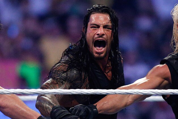 The Shield reacts after their win during Wrestlemania XXX at the Mercedes-Benz Super Dome in New Orleans on Sunday, April 6, 2014. (Jonathan Bachman/AP Images for WWE)