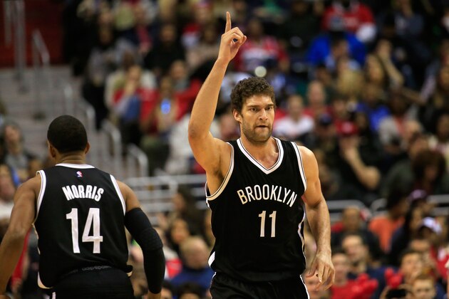 WASHINGTON, DC - JANUARY 16: Brook Lopez #11 of the Brooklyn Nets celebrates after making a second half basket against the Washington Wizards during the Nets 102-80 win at Verizon Center on January 16, 2015 in Washington, DC. NOTE TO USER: User expressly acknowledges and agrees that, by downloading and or using this photograph, User is consenting to the terms and conditions of the Getty Images License Agreement.  (Photo by Rob Carr/Getty Images)
