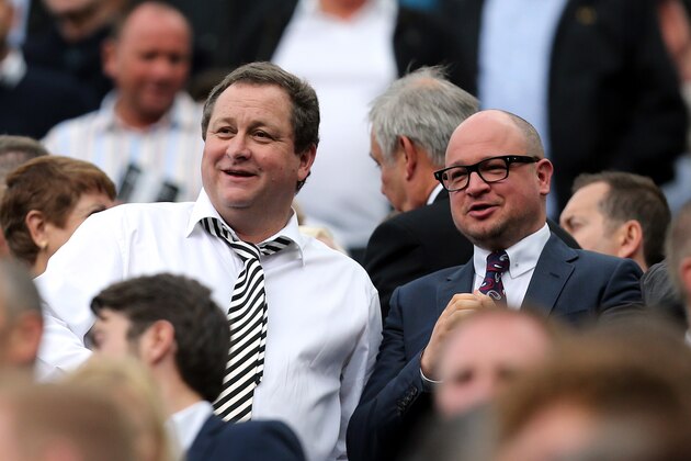 Newcastle United's owner Mike Ashley, left, and managing director Lee Charnley, right, are seen in the stand ahead of their English Premier League soccer match between Newcastle United and Manchester City at St James' Park, Newcastle, England, Sunday, Aug. 17, 2014. (AP Photo/Scott Heppell)