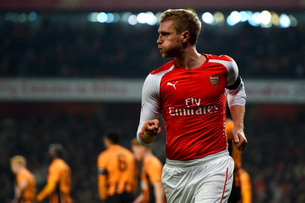 LONDON, ENGLAND - JANUARY 04:  Per Mertesacker of Arsenal celebrates after scoring the opening goal during the FA Cup Third Round match between Arsenal and Hull City at Emirates Stadium on January 4, 2015 in London, England.  (Photo by Paul Gilham/Getty Images)