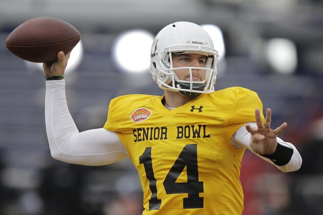 Baylor quarterback Bryce Petty sets back to pass the ball during NCAA college football practice for the Senior Bowl, Thursday, Jan. 22, 2015, at Ladd-Peebles Stadium in Mobile, Ala. (AP Photo/Brynn Anderson)