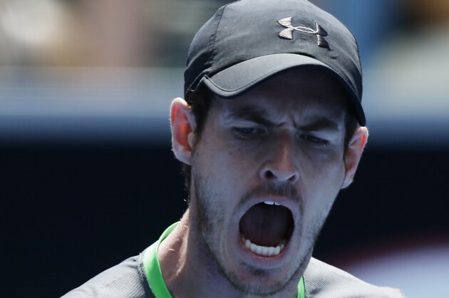 Andy Murray of Britain yells during his second round match against Marinko Matosevic of Australia at the Australian Open tennis championship in Melbourne, Australia, Wednesday, Jan. 21, 2015. (AP Photo/Bernat Armangue)