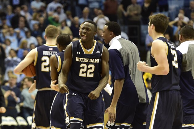 Jan 5, 2015; Chapel Hill, NC, USA; Notre Dame Fighting Irish forward Austin Burgett (20) and guard Jerian Grant (22) and guard Steve Vasturia (32) react after the game. The Fighting Irish defeated the Tar Heels 71-70 at Dean E. Smith Center. Mandatory Credit: Bob Donnan-USA TODAY Sports