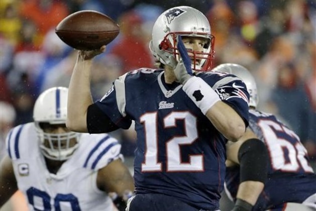 FILE - In this Jan. 18, 2015, file photo, New England Patriots quarterback Tom Brady looks to pass during the first half of the NFL football AFC Championship game against the Indianapolis Colts in Foxborough, Mass. The NFL is investigating whether the Patriots deflated footballs that were used in their AFC championship game victory over the Colts. The inquiry was first reported by the website for WTHR-TV in Indiana, citing an unnamed source. On his regular weekly morning-after-game appearance Monday, Jan. 19, 2015, on WEEI radio, Brady said he wasn't aware of the report about the league's investigation into whether footballs were properly inflated against Indianapolis. (AP Photo/Matt Slocum, File)