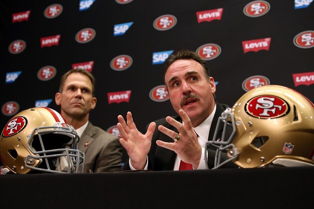 SANTA CLARA, CA - JANUARY 15:  Jim Tomsula speaks during a press conference as San Francisco 49ers general manager Trent Baalke (L) looks on at Levi's Stadium on January 15, 2015 in Santa Clara, California. The San Francisco 49ers announced Jim Tomsula as their new head coach to replace Jim Harbaugh.  (Photo by Justin Sullivan/Getty Images)