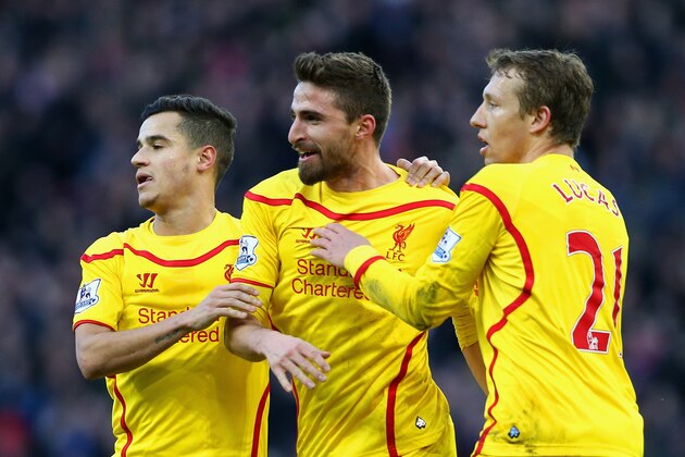 BIRMINGHAM, ENGLAND - JANUARY 17:  Fabio Borini of Liverpool celebrates scoring their first goal with team mates during the Barclays Premier League match between Aston Villa and Liverpool at Villa Park on January 17, 2015 in Birmingham, England.  (Photo by Clive Mason/Getty Images)