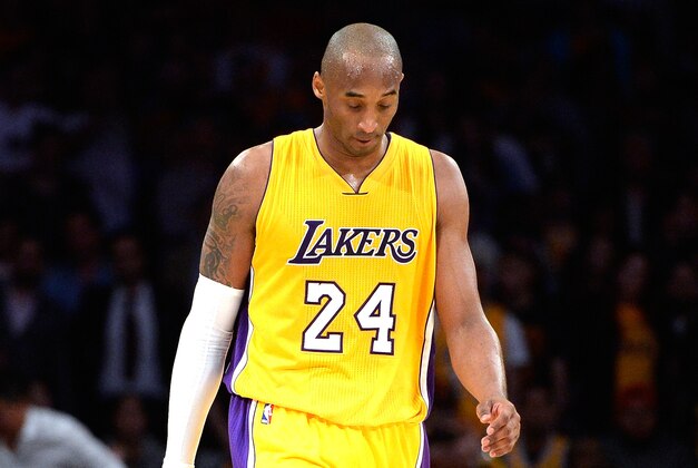 LOS ANGELES, CA - JANUARY 15:  Kobe Bryant #24 of the Los Angeles Lakers reacts as the Lakers trail late in the fourth quarter to the Cleveland Cavaliers at Staples Center on January 15, 2015 in Los Angeles, California.  The Cavaliers won 109-102.   NOTE TO USER: User expressly acknowledges and agrees that, by downloading and or using this Photograph, user is consenting to the terms and condition of the Getty Images License Agreement.  (Photo by Harry How/Getty Images)