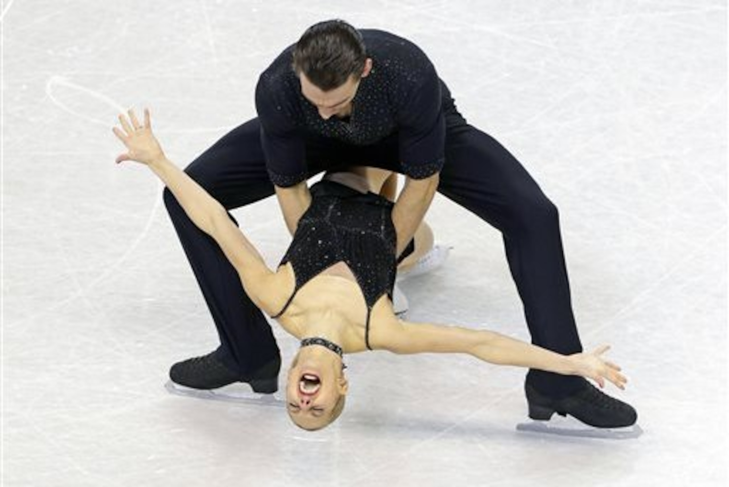 Alexa Scimeca and Christopher Knierim skate during the pairs short program at the U.S. Figure Skating Championships in Greensboro, N.C., Thursday, Jan. 22, 2015. (AP Photo/Chuck Burton)