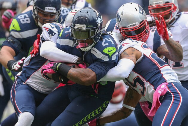 SEATTLE, WA - OCTOBER 14:  Running back Marshawn Lynch #24 of the Seattle Seahawks rushes against the New England Patriots at CenturyLink Field on October 14, 2012 in Seattle, Washington.  (Photo by Otto Greule Jr/Getty Images)