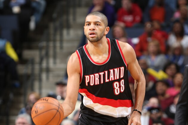 MEMPHIS, TN - JANUARY 17:  Nicolas Batum #88 of the Portland Trail Blazers brings the ball up court against the Memphis Grizzlies on January 17, 2015 at the FedExForum in Memphis, Tennessee.  NOTE TO USER: User expressly acknowledges and agrees that, by downloading and or using this Photograph, user is consenting to the terms and conditions of the Getty Images License Agreement. Mandatory Copyright Notice: Copyright 2015 NBAE (Photo by Joe Murphy/NBAE via Getty Images)