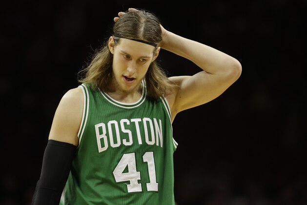 Boston Celtics' Kelly Olynyk in action during an NBA basketball game against the Philadelphia 76ers, Monday, Dec. 15, 2014, in Philadelphia. (AP Photo/Matt Slocum)