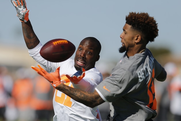 IMAGE DISTRIBUTED FOR USAA - NFL Pro Bowler Odell Beckham Jr., right, and Vontae Davis battle for the ball during an NFL Pro Bowl practice at Luke Air Force Base sponsored by USAA, the Official Military Sponsor of the NFL, on Thursday, Jan. 22, 2015 in Glendale, Arizona. (Rick Scuteri/AP Images for USAA)