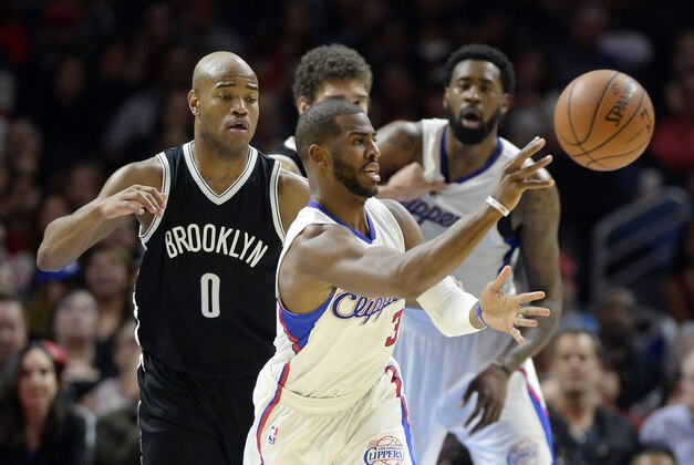 Jan 22, 2015; Los Angeles, CA, USA; Los Angeles Clippers guard Chris Paul (3) passes the ball away from Brooklyn Nets guard Jarrett Jack (0) during the first half at Staples Center. Mandatory Credit: Richard Mackson-USA TODAY Sports