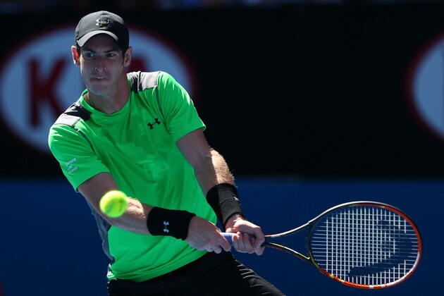 MELBOURNE, AUSTRALIA - JANUARY 23:  Andy Murray of Great Britain plays a backhand in his third round match against Joao Sousa of Portugal during day five of the 2015 Australian Open at Melbourne Park on January 23, 2015 in Melbourne, Australia.  (Photo by Clive Brunskill/Getty Images)