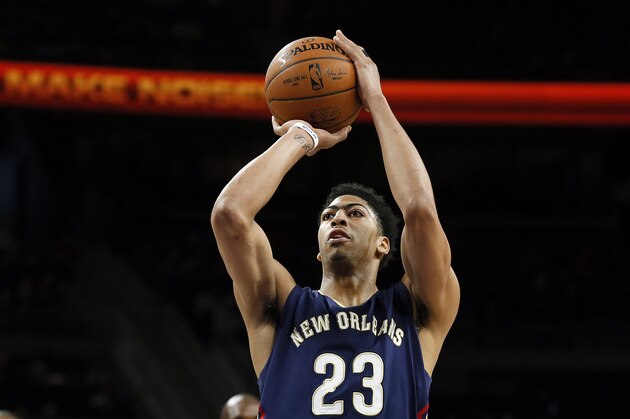 New Orleans Pelicans forward Anthony Davis (23) shoots against the Detroit Pistons in the second half of an NBA basketball game in Auburn Hills, Mich., Wednesday, Jan. 14, 2015. (AP Photo/Paul Sancya)