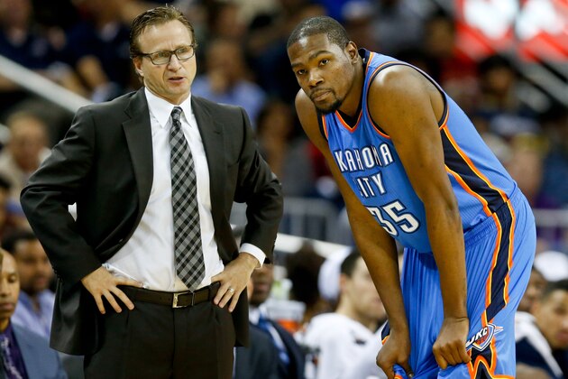 Dec 2, 2014; New Orleans, LA, USA; Oklahoma City Thunder head coach Scott Brooks (L) talks with forward Kevin Durant (35) during the second quarter against the New Orleans Pelicans at the Smoothie King Center. Mandatory Credit: Derick E. Hingle-USA TODAY Sports