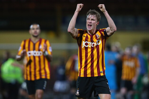 BRADFORD, ENGLAND - JANUARY 14:  Stephen Darby of Bradford City celebrates after the FA Cup Third Round Replay match between Bradford City and Millwall at Coral Windows Stadium, Valley Parade on January 14, 2015 in Bradford, England.  (Photo by Alex Livesey/Getty Images)