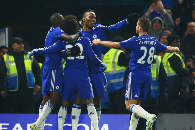LONDON, ENGLAND - JANUARY 04:  Willian of Chelsea (22) celebrates with Ramires (L), Didier Drogba (2R) and Cesar Azpilicueta (R) as he scores their first goal during the FA Cup Third Round match between Chelsea and Watford at Stamford Bridge on January 4, 2015 in London, England.  (Photo by Richard Heathcote/Getty Images)