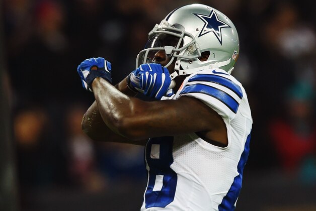 Dallas Cowboys wide receiver Dez Bryant (88) celebrates his touchdown against the Jacksonville Jaguars during the first half of an NFL football game at Wembley Stadium, London, Sunday, Nov. 9, 2014.  (AP Photo/Tim Ireland)