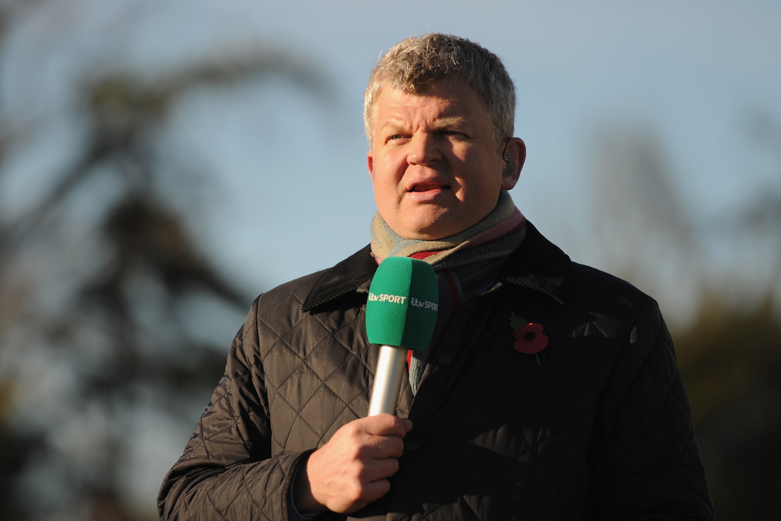 BISHOP'S STORTFORD, ENGLAND - NOVEMBER 10:  ITV's Adrian Chiles before the FA Cup First Round match between Bishop's Storford and Northampton Town ProKit UK stadium on November 10, 2013 in Bishop's Stortford, England.  (Photo by Shaun Botterill/Getty Images)
