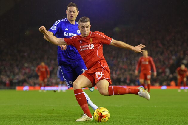 LIVERPOOL, ENGLAND - JANUARY 20: Jordan Henderson of Liverpool is closed down by Nemanja Matic of Chelsea during the Capital One Cup Semi-Final first leg match between Liverpool and Chelsea at Anfield on January 20, 2015 in Liverpool, England.  (Photo by Michael Regan/Getty Images)