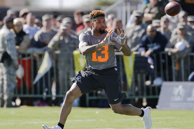 IMAGE DISTRIBUTED FOR USAA - NFL Pro Bowler Odell Beckham Jr. catches a pass during an NFL Pro Bowl practice at Luke Air Force Base sponsored by USAA, the Official Military Sponsor of the NFL, on Thursday, Jan. 22, 2015 in Glendale, Arizona. (Rick Scuteri/AP Images for USAA)