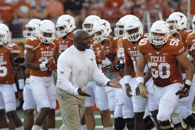 AUSTIN, TX - SEPTEMBER 6: Head coach Charlie Strong of the Texas Longhorns encourages his team in warmups before playing the BYU Cougars on September 6, 2014 at Darrell K Royal-Texas Memorial Stadium in Austin, Texas. (Photo by Chris Covatta/Getty Images)