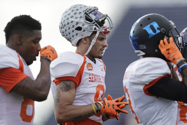 Ohio State wide receiver Devin Smith, center, lines up with other players to run drills during NCAA college football practice for the Senior Bowl, Tuesday, Jan. 20, 2015, at Ladd-Peebles Stadium in Mobile, Ala. (AP Photo/Brynn Anderson) Ohio State wide receiver Devin Smith, center, lines up with other players to run drills during NCAA college football practice for the Senior Bowl, Tuesday, Jan. 20, 2015, at Ladd-Peebles Stadium in Mobile, Ala. (AP Photo/Brynn Anderson)