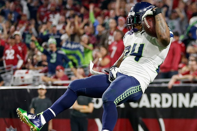 GLENDALE, AZ - DECEMBER 21: Running back Marshawn Lynch #24 of the Seattle Seahawks leaps to score a 79 yard touchdown in the fourth quarter during the NFL game against the Arizona Cardinals at the University of Phoenix Stadium on December 21, 2014 in Glendale, Arizona. The Seahawks defeated the Cardinals 35-6. (Photo by Christian Petersen/Getty Images) GLENDALE, AZ - DECEMBER 21: Running back Marshawn Lynch #24 of the Seattle Seahawks leaps to score a 79 yard touchdown in the fourth quarter during the NFL game against the Arizona Cardinals at the University of Phoenix Stadium on December 21, 2014 in Glendale, Arizona. The Seahawks defeated the Cardinals 35-6. (Photo by Christian Petersen/Getty Images)
