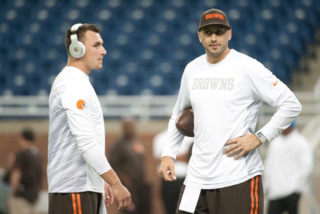 Aug 9, 2014; Detroit, MI, USA; Cleveland Browns quarterback Johnny Manziel (left) and quarterback Brian Hoyer (right) before the game against the Detroit Lions at Ford Field. Mandatory Credit: Tim Fuller-USA TODAY Sports