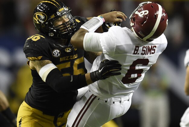 Dec 6, 2014; Atlanta, GA, USA; Missouri Tigers defensive lineman Shane Ray (56) tackles Alabama Crimson Tide quarterback Blake Sims (6) during the second quarter of the 2014 SEC Championship Game at the Georgia Dome. The play caused Ray to be ejected from the game for targeting. Mandatory Credit: Dale Zanine-USA TODAY Sports