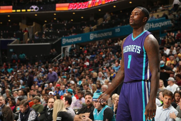 CHARLOTTE, NC - JANUARY 17:  Lance Stephenson #1 of the Charlotte Hornets waits to go in against the Indiana Pacers during the game at the Time Warner Cable Arena on January 17, 2015 in Charlotte, North Carolina. NOTE TO USER: User expressly acknowledges and agrees that, by downloading and or using this photograph, User is consenting to the terms and conditions of the Getty Images License Agreement.  Mandatory Copyright Notice:  Copyright 2015 NBAE (Photo by Kent Smith/NBAE via Getty Images)