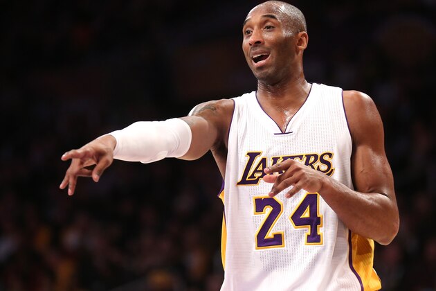 LOS ANGELES, CA - JANUARY 04:  Kobe Bryant #24 of the Los Angeles Lakers gives some on court coaching to a teammate during the game against the Indiana Pacers at Staples Center on January 4, 2015 in Los Angeles, California.The Lakers won 88-87.  NOTE TO USER: User expressly acknowledges and agrees that, by downloading and or using this photograph, User is consenting to the terms and conditions of the Getty Images License Agreement.  (Photo by Stephen Dunn/Getty Images)