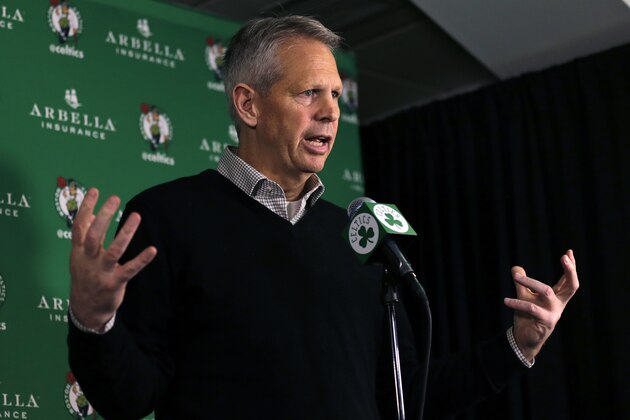 Danny Ainge, Boston Celtics president of basketball operations, discusses the trade of point guard Rajon Rondo prior to an NBA basketball game in Boston, Friday, Dec. 19, 2014. The Celtics traded Rondo to Dallas on Thursday night, Dec. 18, 2014, cutting ties with the last remnant of Boston's last NBA championship while giving Dirk Nowitzki and the Mavericks a chance at another title. (AP Photo/Charles Krupa)