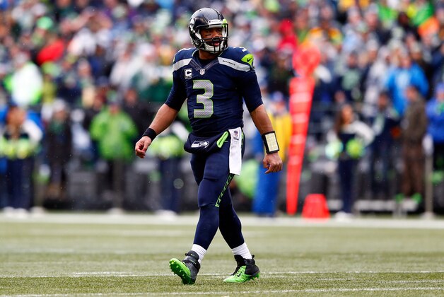SEATTLE, WA - JANUARY 18:  Russell Wilson #3 of the Seattle Seahawks looks on against the Green Bay Packers during the 2015 NFC Championship game at CenturyLink Field on January 18, 2015 in Seattle, Washington.  (Photo by Kevin C. Cox/Getty Images)