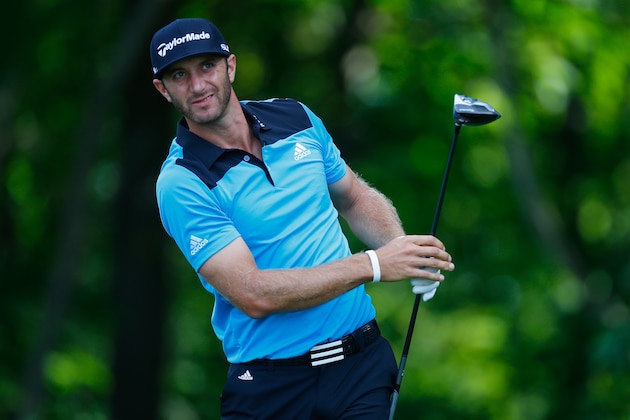 CROMWELL, CT - JUNE 20: Dustin Johnson of the United States watches his tee shot on the 12th hole during the second round of the Travelers Championship golf tournament at the TPC River Highlands on June 20, 2014 in Cromwell, Connecticut.  (Photo by Jeff Haynes/Getty Images)