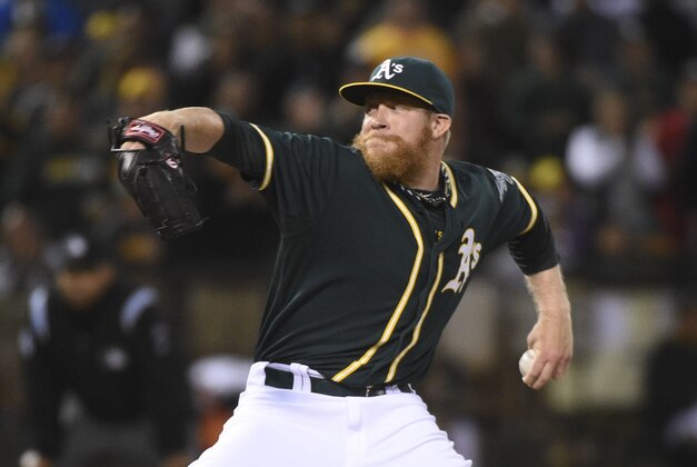 August 22, 2014; Oakland, CA, USA; Oakland Athletics relief pitcher Sean Doolittle (62) delivers a pitch against the Los Angeles Angels during the ninth inning at O.co Coliseum. The Athletics defeated the Angels 5-3. Mandatory Credit: Kyle Terada-USA TODAY Sports August 22, 2014; Oakland, CA, USA; Oakland Athletics relief pitcher Sean Doolittle (62) delivers a pitch against the Los Angeles Angels during the ninth inning at O.co Coliseum. The Athletics defeated the Angels 5-3. Mandatory Credit: Kyle Terada-USA TODAY Sports
