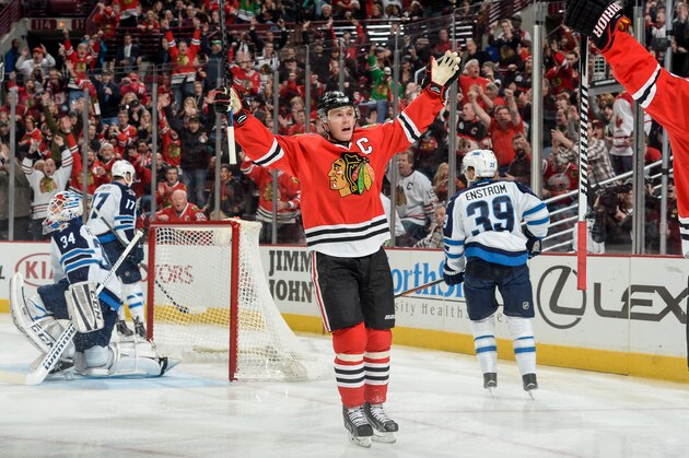 CHICAGO, IL - JANUARY 16: Captain Jonathan Toews #19 of the Chicago Blackhawks reacts after Brandon Saad #20 (not pictured) scored against the Winnipeg Jets in the first period during the NHL game at the United Center on January 16, 2015 in Chicago, Illinois. (Photo by Bill Smith/NHLI via Getty Images) CHICAGO, IL - JANUARY 16: Captain Jonathan Toews #19 of the Chicago Blackhawks reacts after Brandon Saad #20 (not pictured) scored against the Winnipeg Jets in the first period during the NHL game at the United Center on January 16, 2015 in Chicago, Illinois. (Photo by Bill Smith/NHLI via Getty Images)
