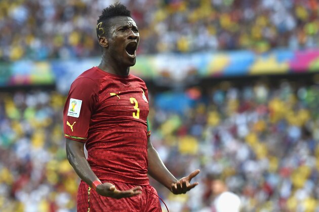 FORTALEZA, BRAZIL - JUNE 21:  Asamoah Gyan of Ghana celebrates scoring his team's second goal during the 2014 FIFA World Cup Brazil Group G match between Germany and Ghana at Castelao on June 21, 2014 in Fortaleza, Brazil.  (Photo by Laurence Griffiths/Getty Images)